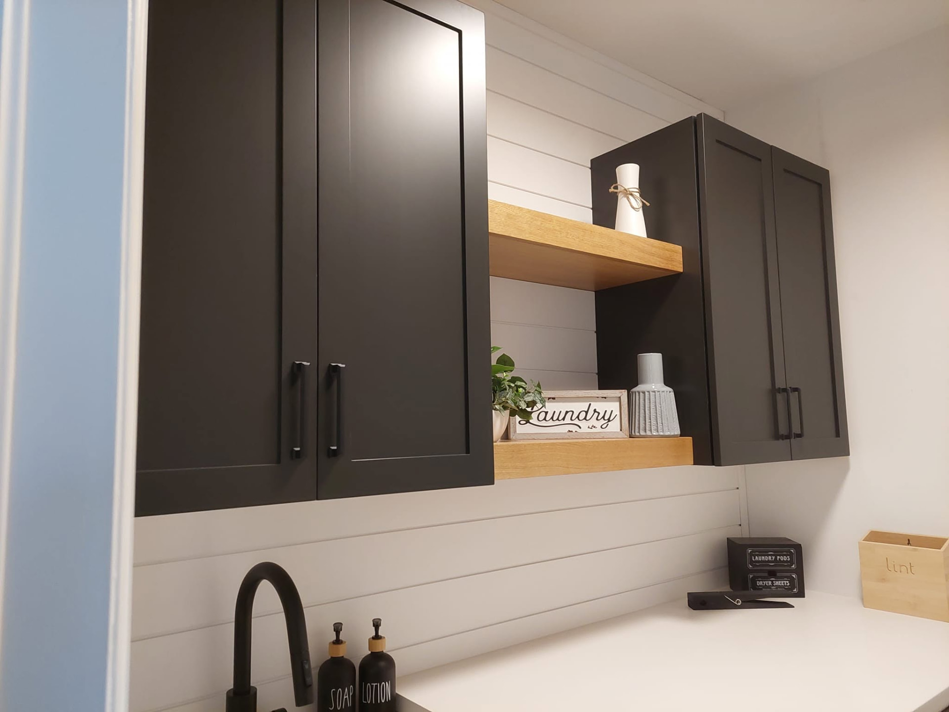 Black Laundry Cabinetry — custom wall units in Severn, Ontario